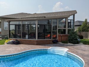 Sunroom overlooking the pool