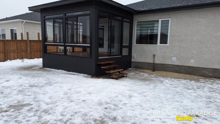 Black curtain wall sunroom in Lorette, Manitoba