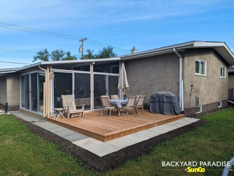 Sandalwood and white studio sunroom at grade with treated wood deck in Charleswood, Winnipeg