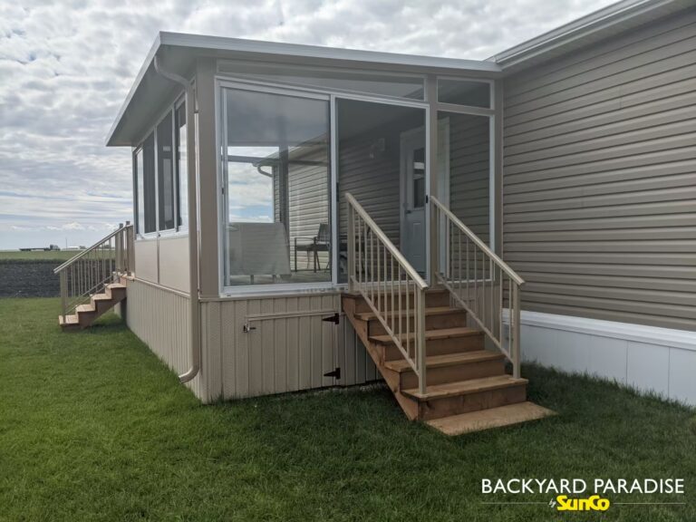 Sandalwood and white studio sunroom with solid kneewalls installed in Sanford, Manitoba