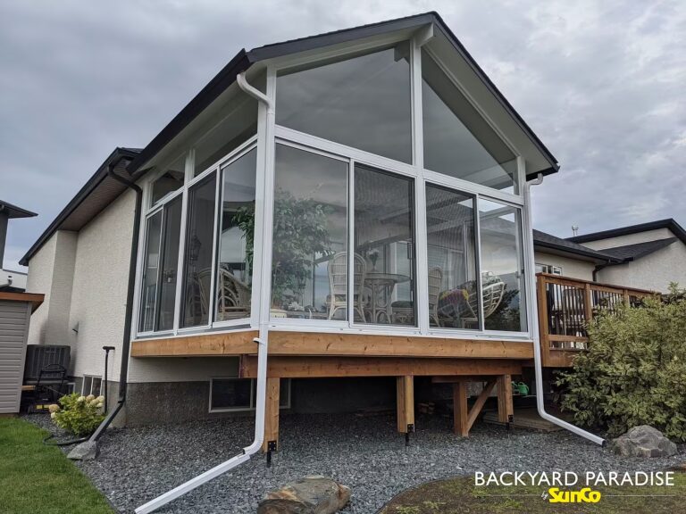 white gable sunroom with treated deck sage creek winnipeg
