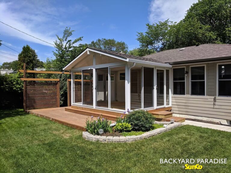 white gable sunroom with treated deck westwood winnipeg manitoba
